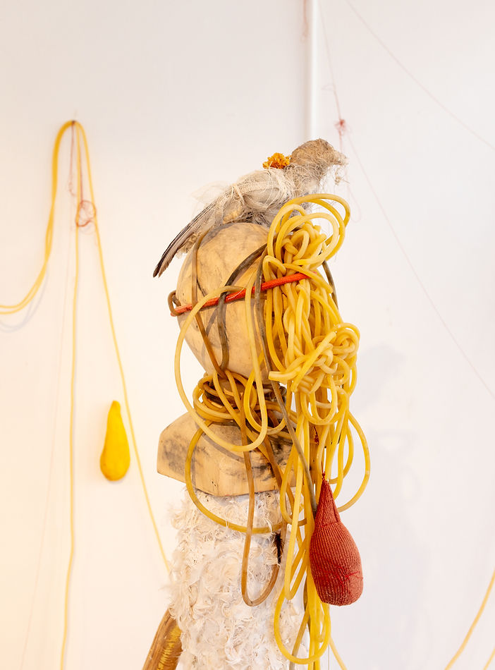 sculpture head with chain.jpg